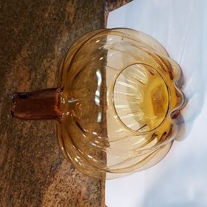 Amber art glass pumpkin votive candle holder